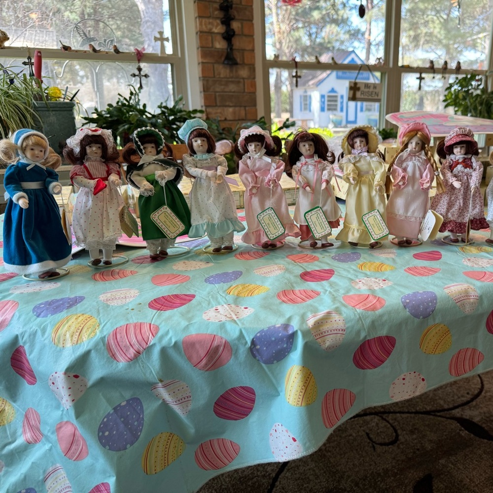 Months to Remember Porcelain Dolls by Russ. $86.00 for 12 dolls.
